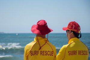 surf life saving first aid - two surf lifesavers on patrol